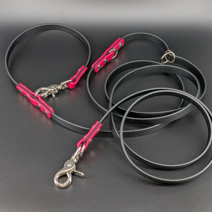 black and pink biothane hands free dog leash with adjustable waist attachment