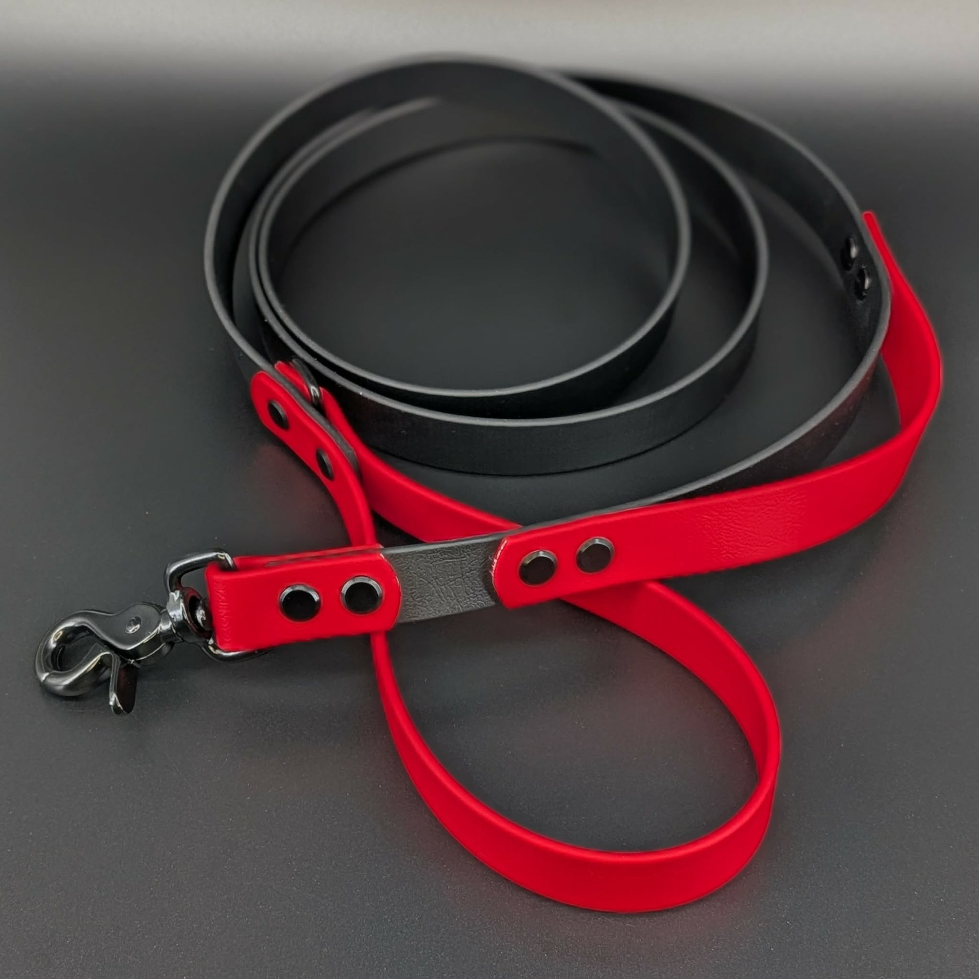 black and red biothane dog leash with built in traffic handle