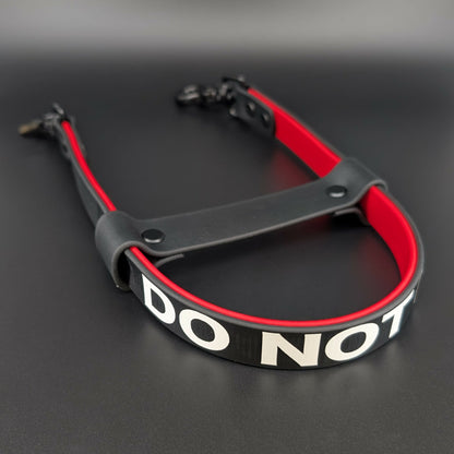 black and red layered biothane pull strap with do not pet text