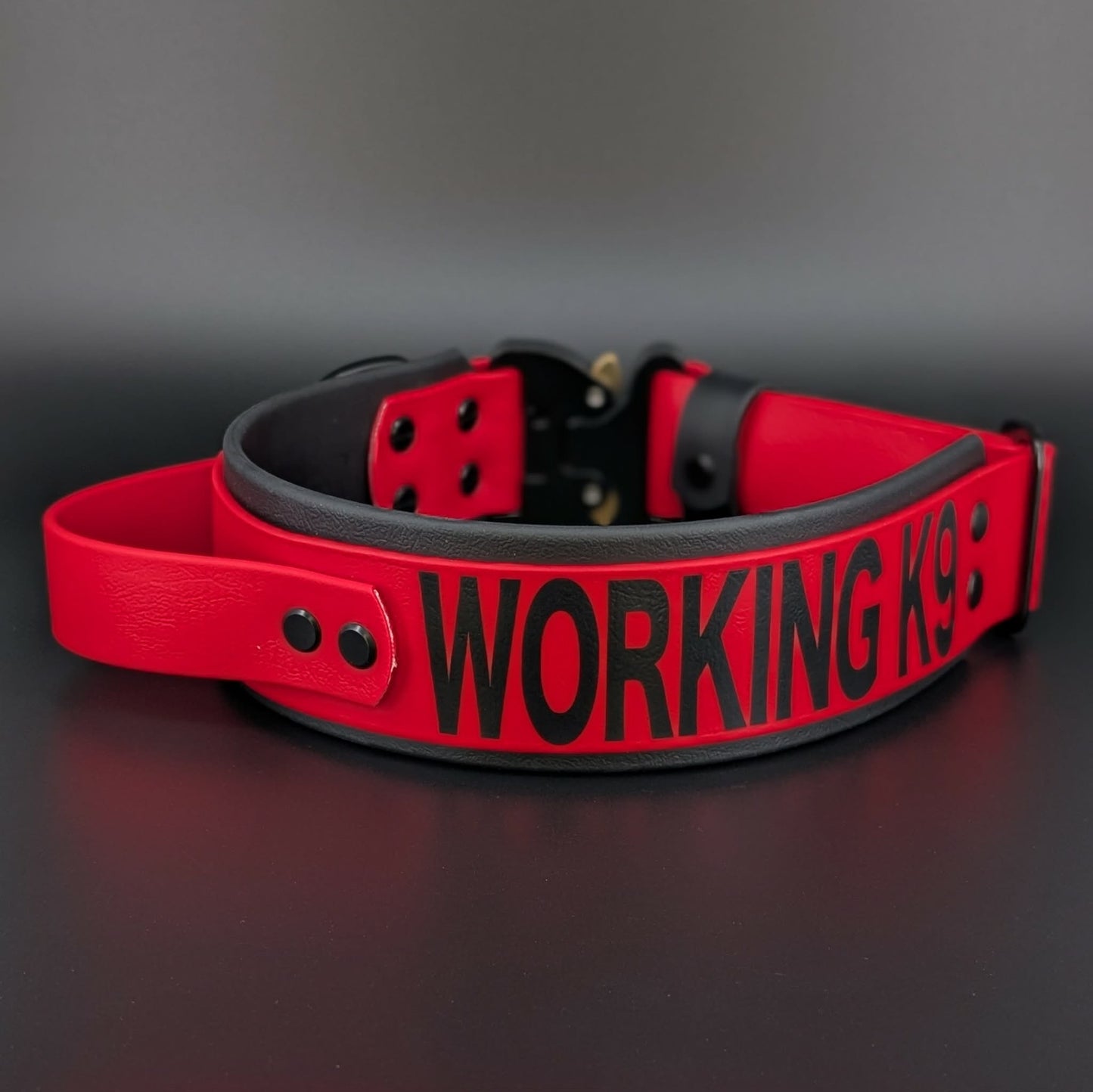 black and red layered biothane working k9 collar with tactical handle and quick release cobra buckle