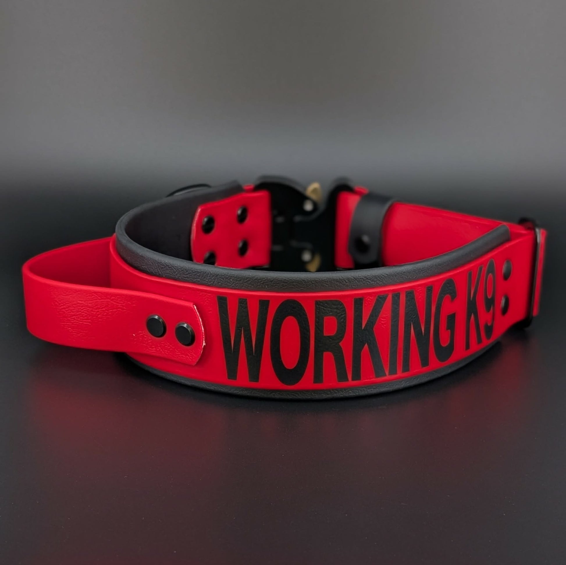 black and red layered biothane working k9 collar with tactical handle and quick release cobra buckle