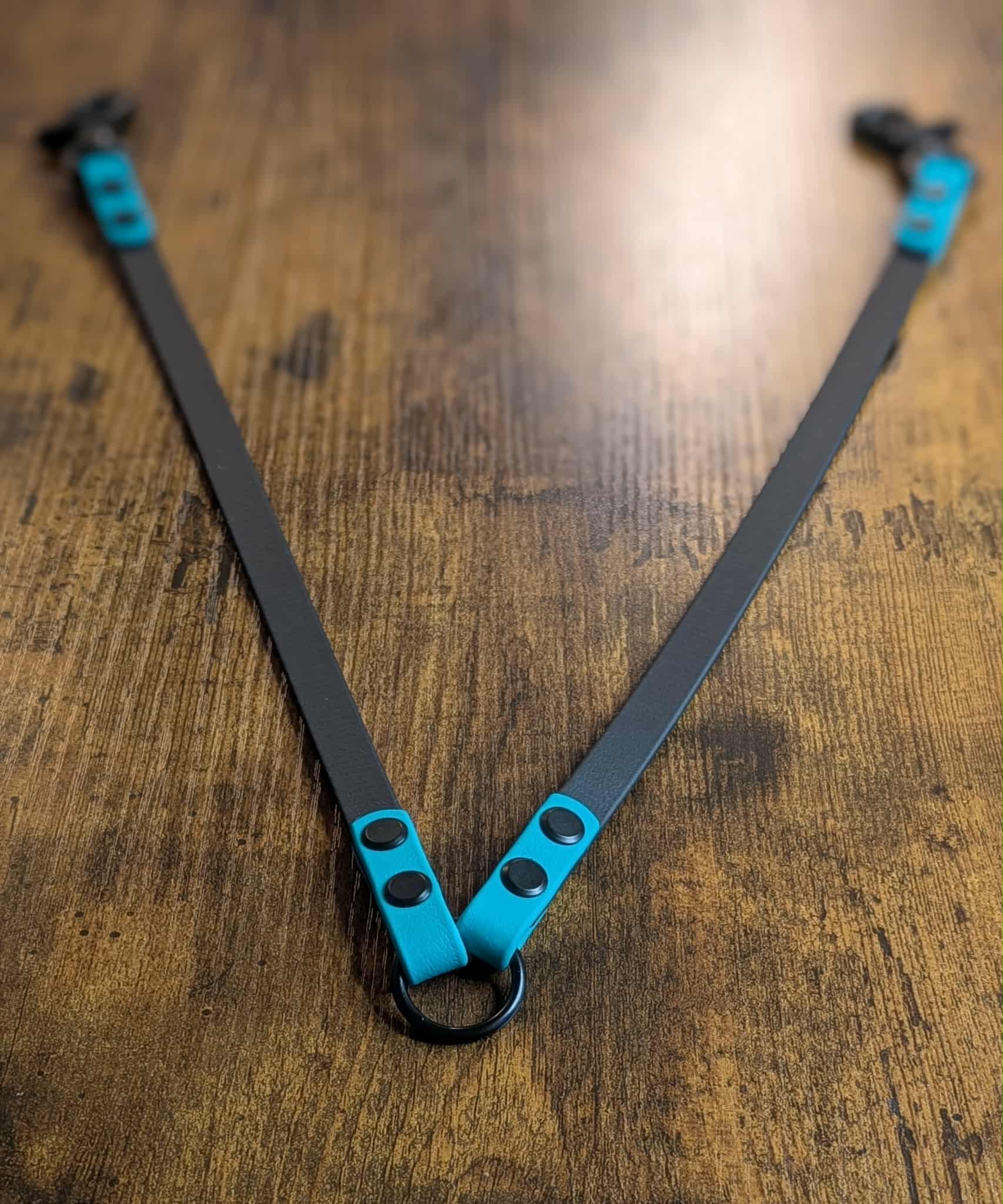 black and teal biothane dog leash coupler for walking two dogs