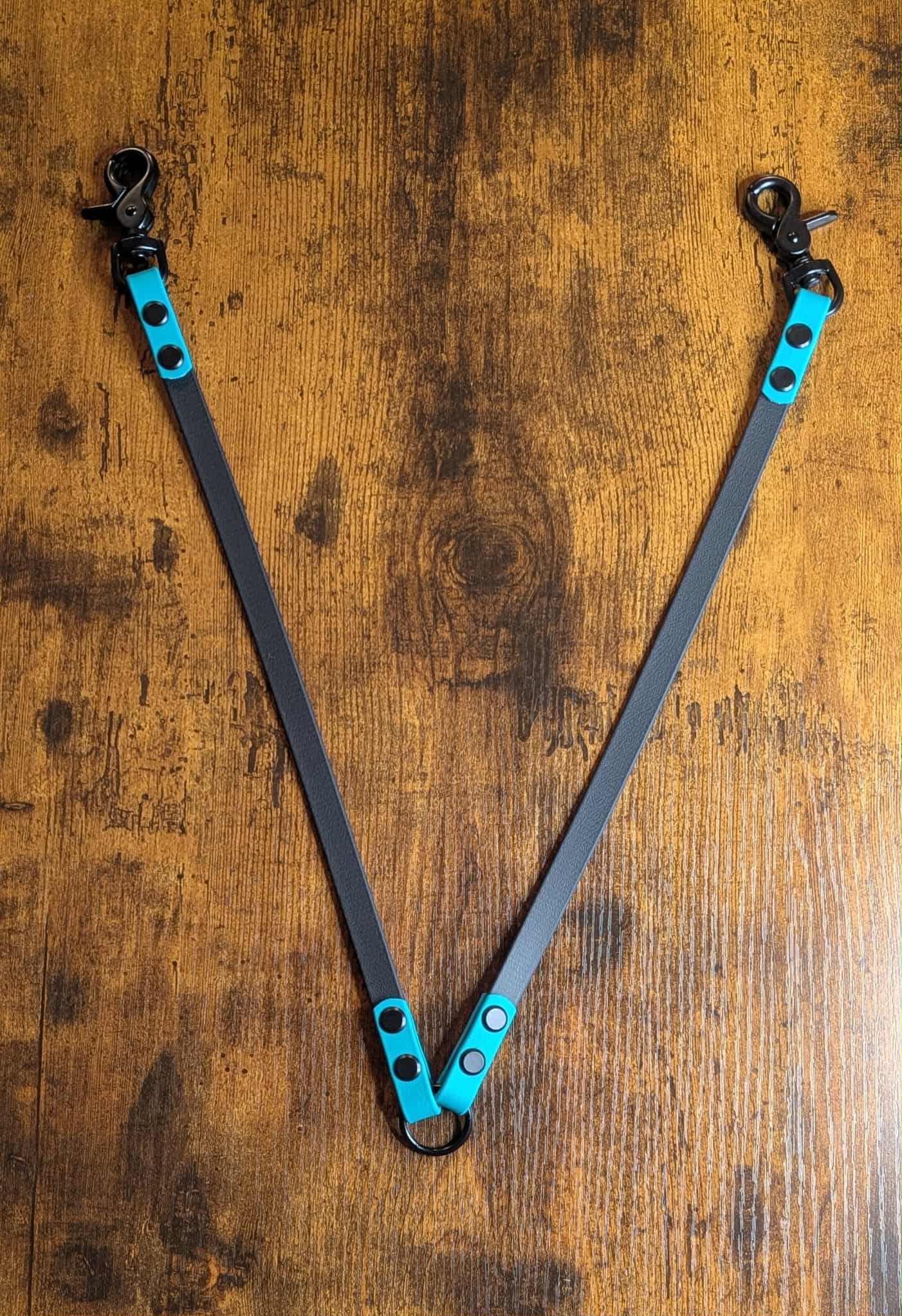 back and teal biothane dog leash coupler