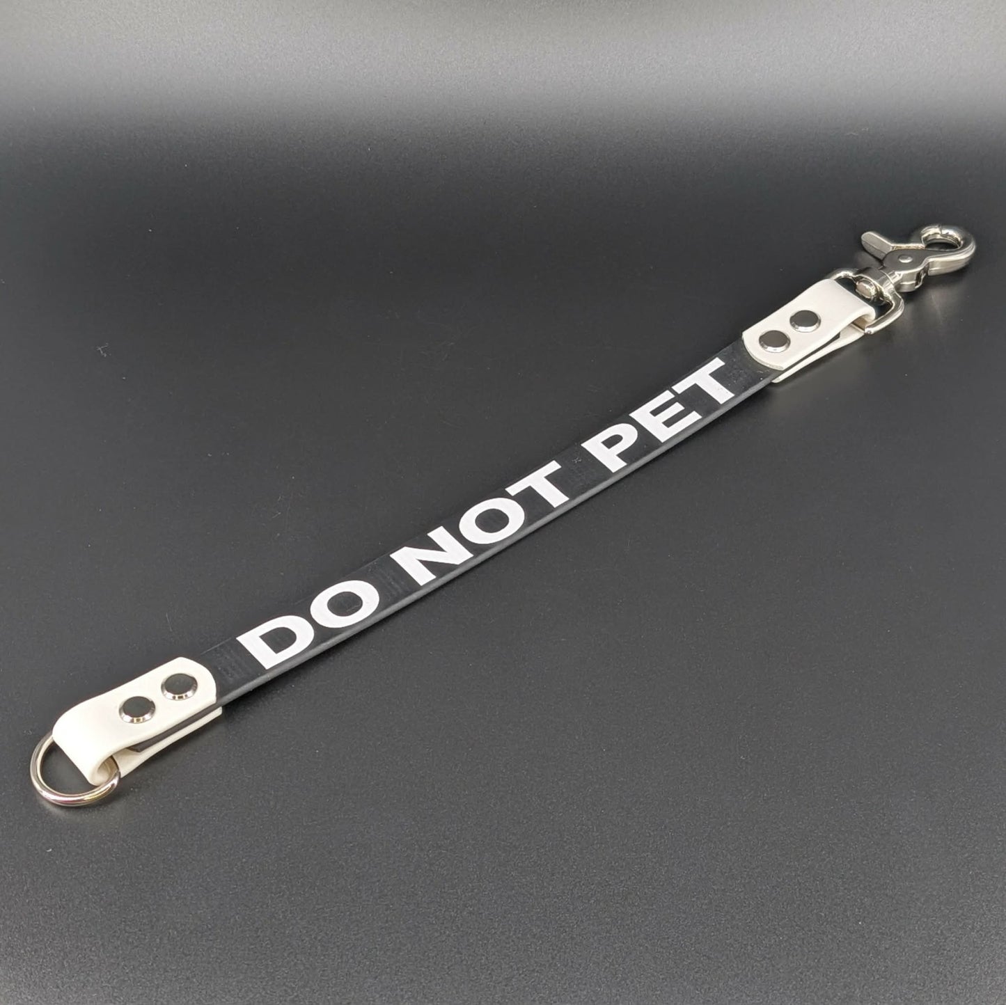 black and white biothane do not pet leash extender warning