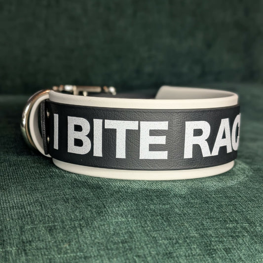 Black and white biothane dog collar with 'I BITE RACISTS' text