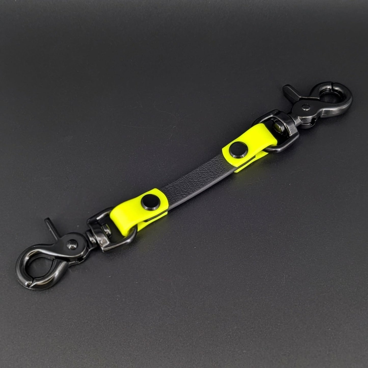 black and yellow biothane prong collar backup safety clip