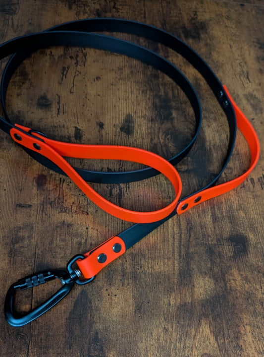 black and orange biothane dog leash with built in traffic handle and twist lock carabiner