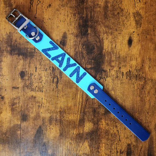 blue tapered biothane dog collar with custom glitter text
