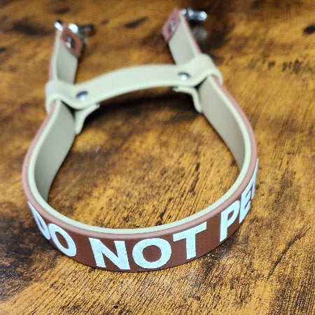 brown and tan layered biothane pull strap with custom text
