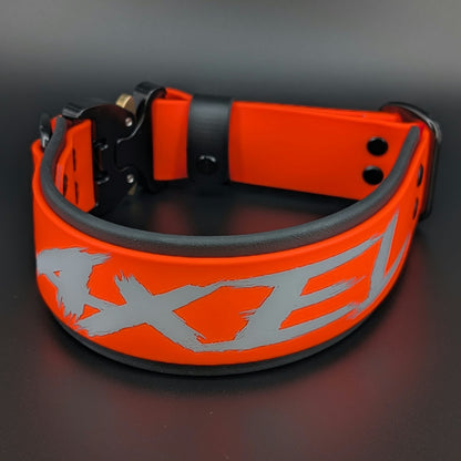 custom 2 inch wide black and orange layered biothane dog collar with personalized text and quick release cobra buckle