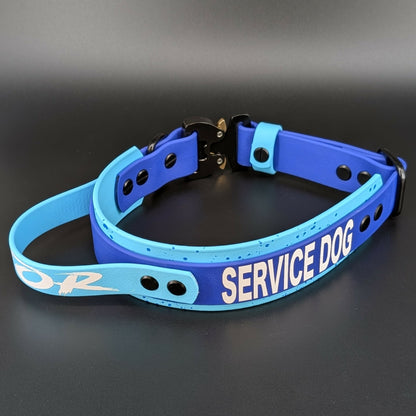 custom light blue and royal blue layered biothane service dog collar with handle and quick release cobra buckle and splatter paint