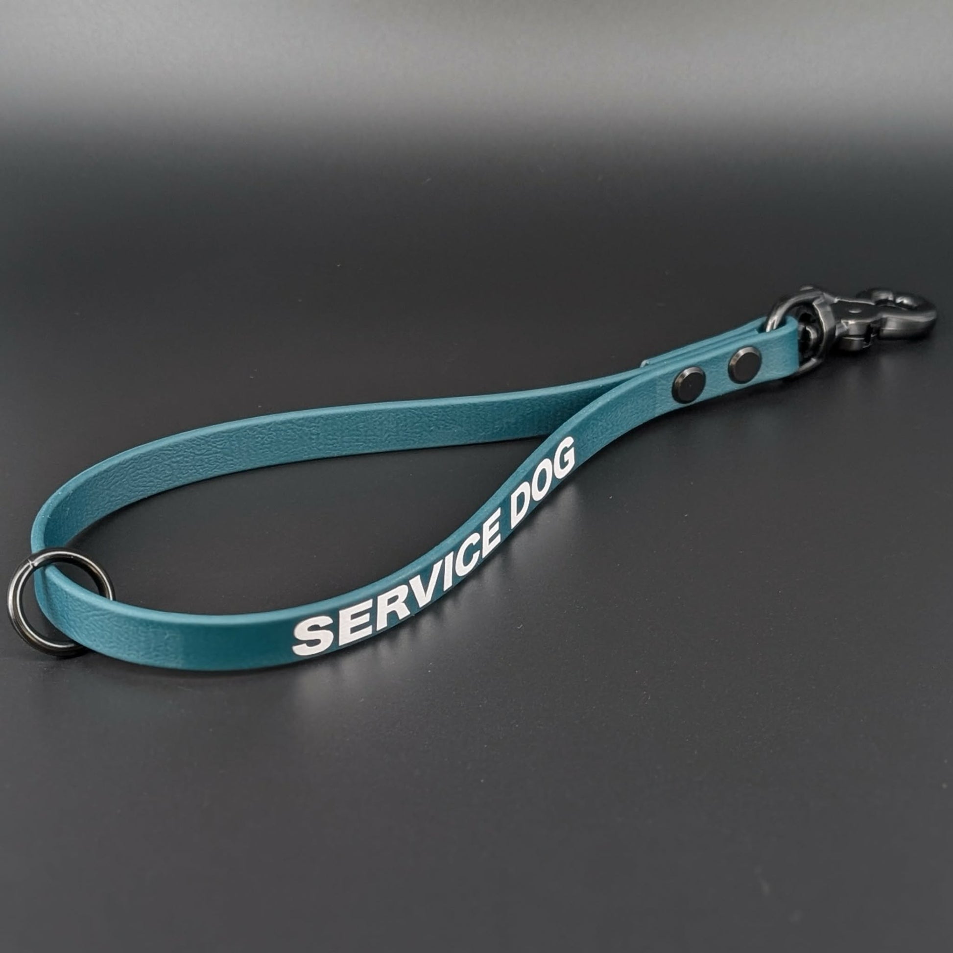 dark green biothane traffic handle with black hardware and white service dog text