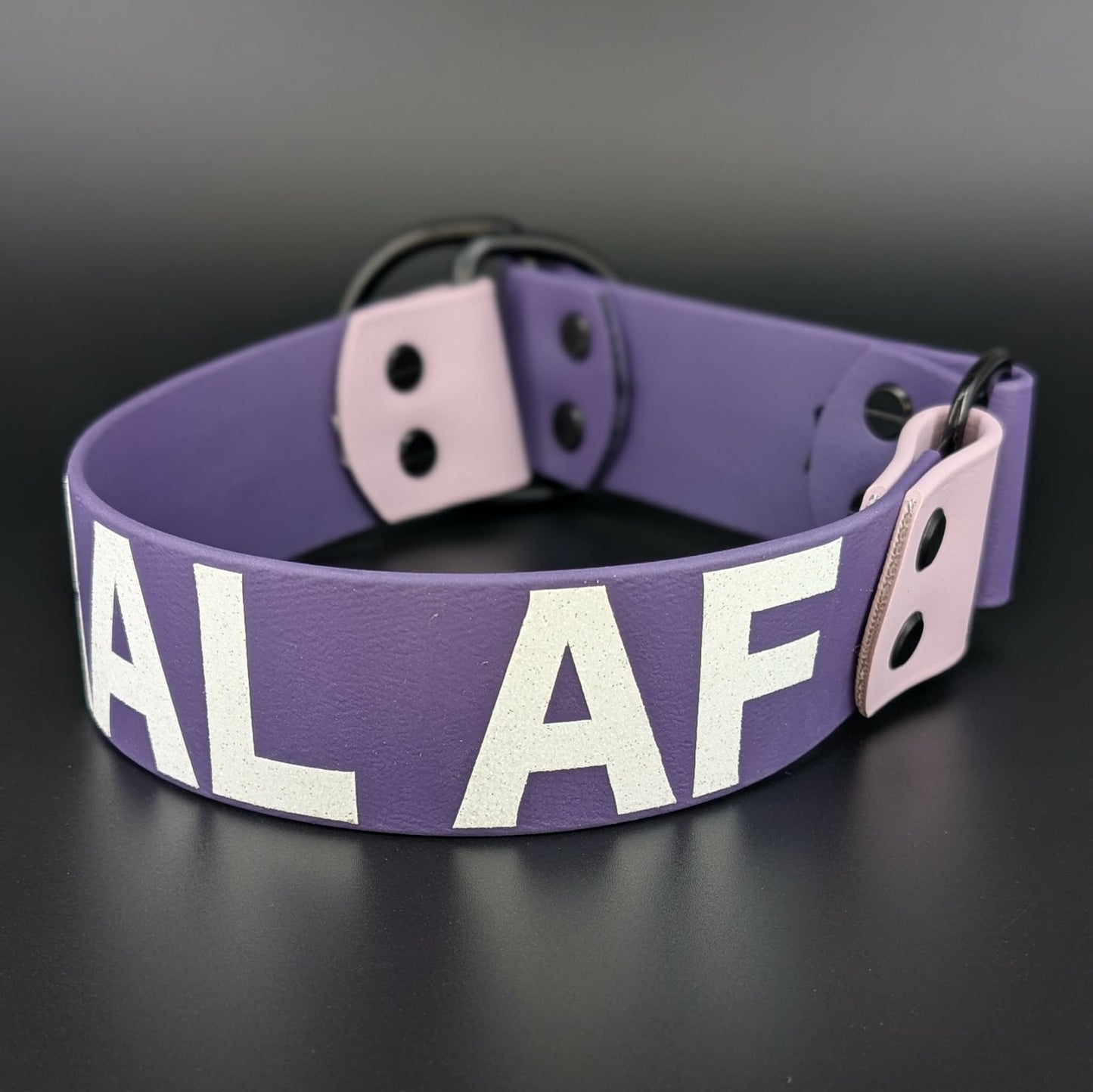 dark purple and lavender biothane limited slip collar feral af text