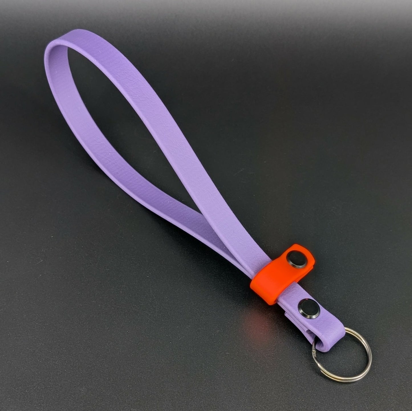 dark purple and orange biothane adjustable wrist strap for e-collar remote transmitter