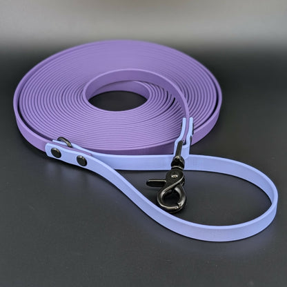 dark purple and periwinkle biothane 30 foot long line with black hardware
