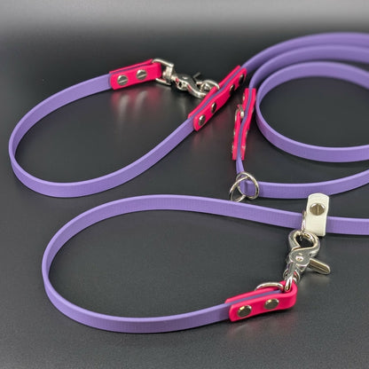 dark purple and pink and white biothane hands free dog leash with slip lead and adjustable waist attachment point