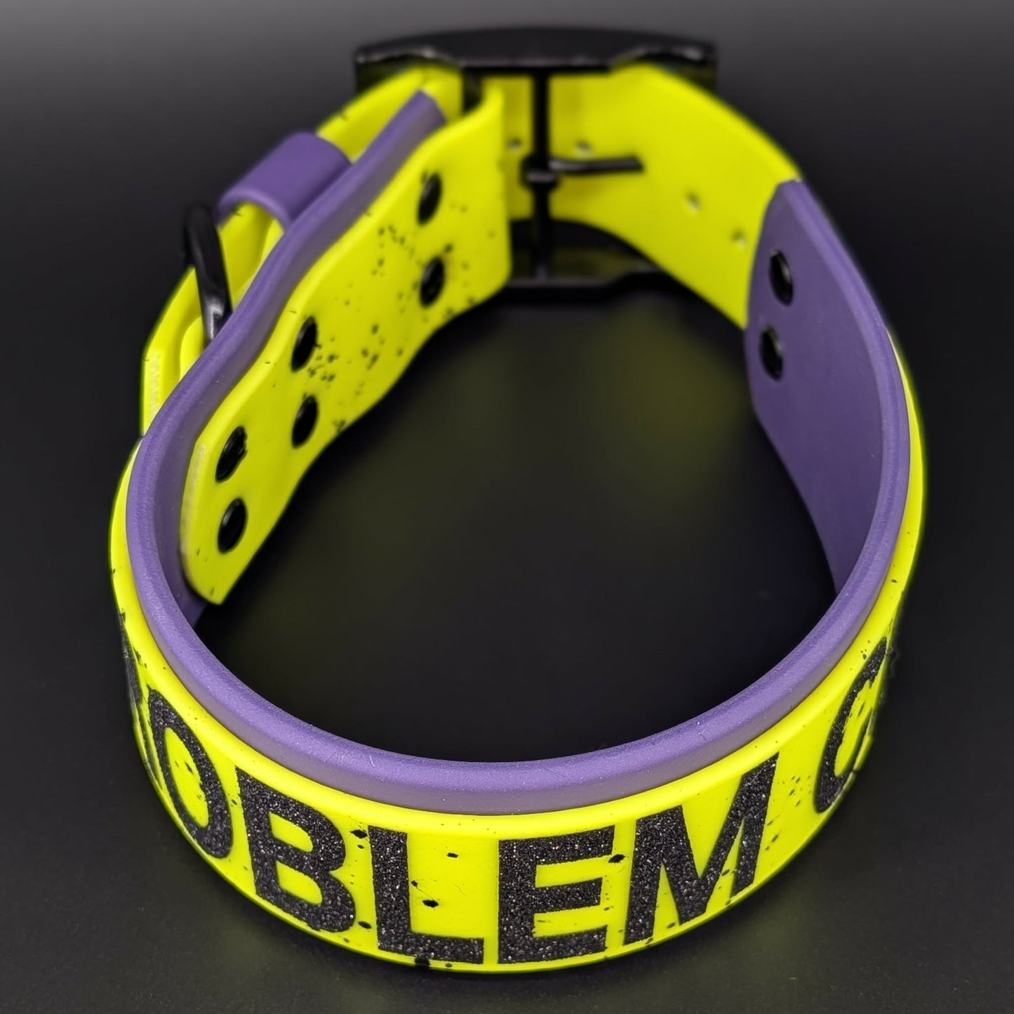 dark purple and yellow biothane problem child dog collar with splatter paint and black hardware