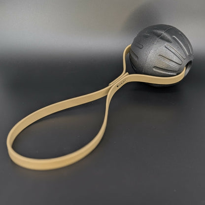 large black eva foam ball tug with tan biothane loop handle