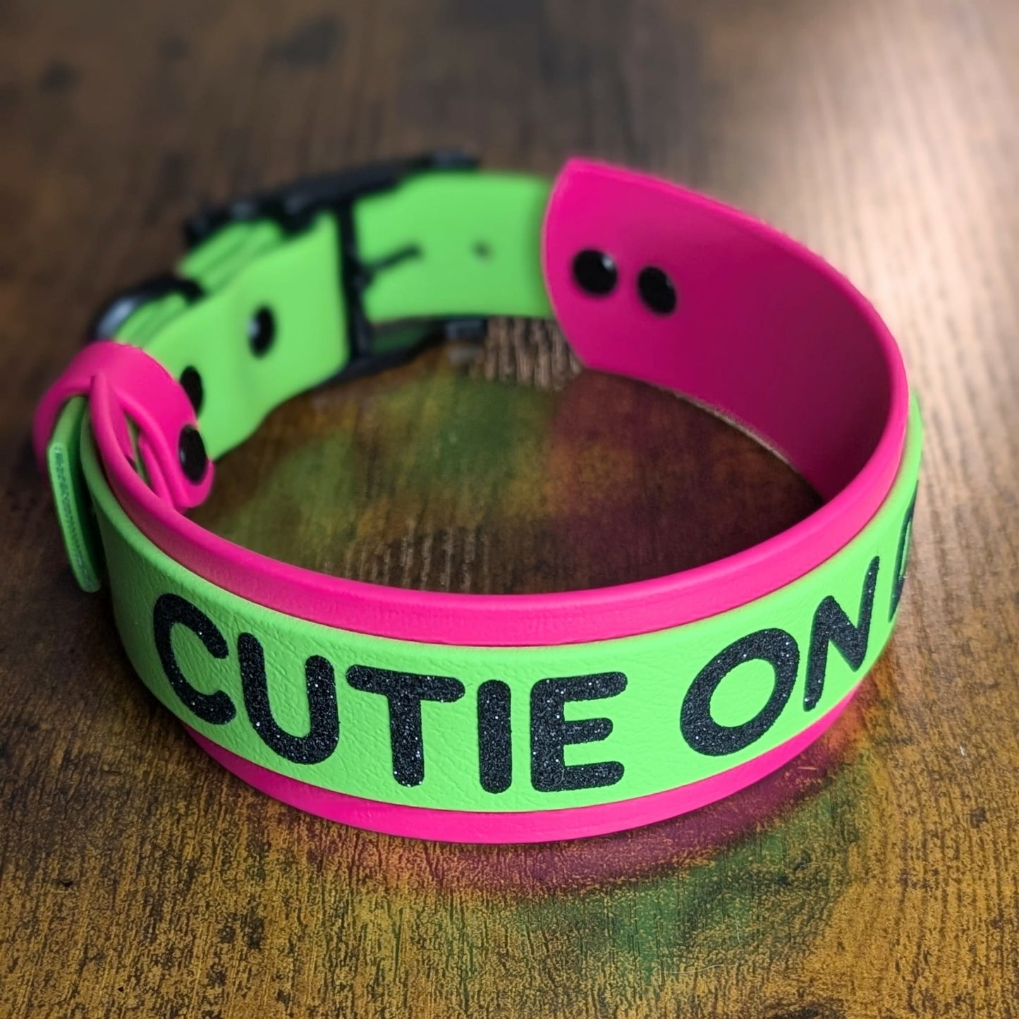 layered pink and green biothane dog collar with cutie on duty text