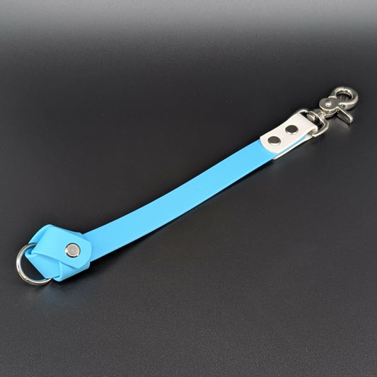 light blue and white biothane knotted traffic tab with o ring