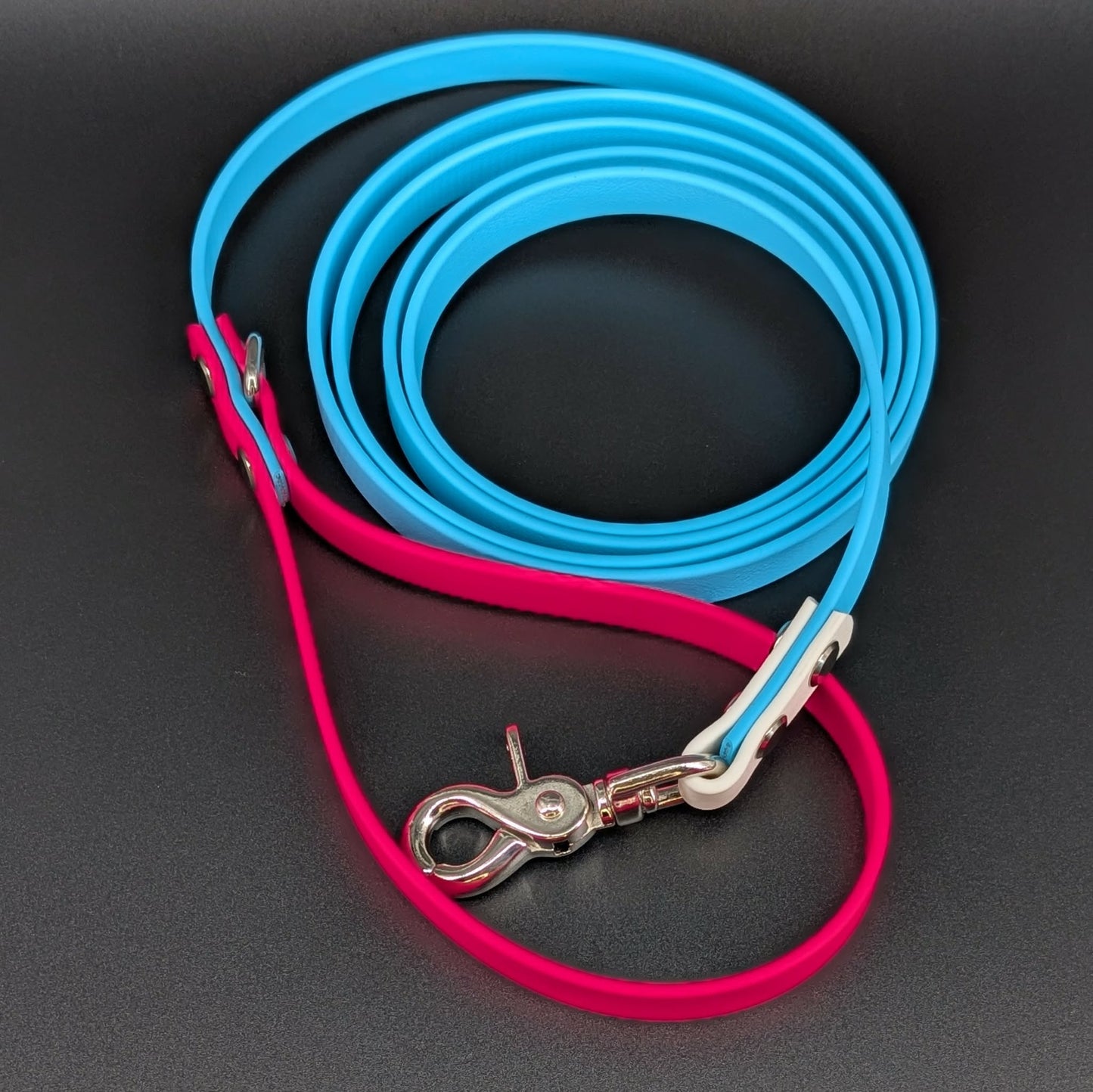light blue pink and white biothane dog leash with silver hardware