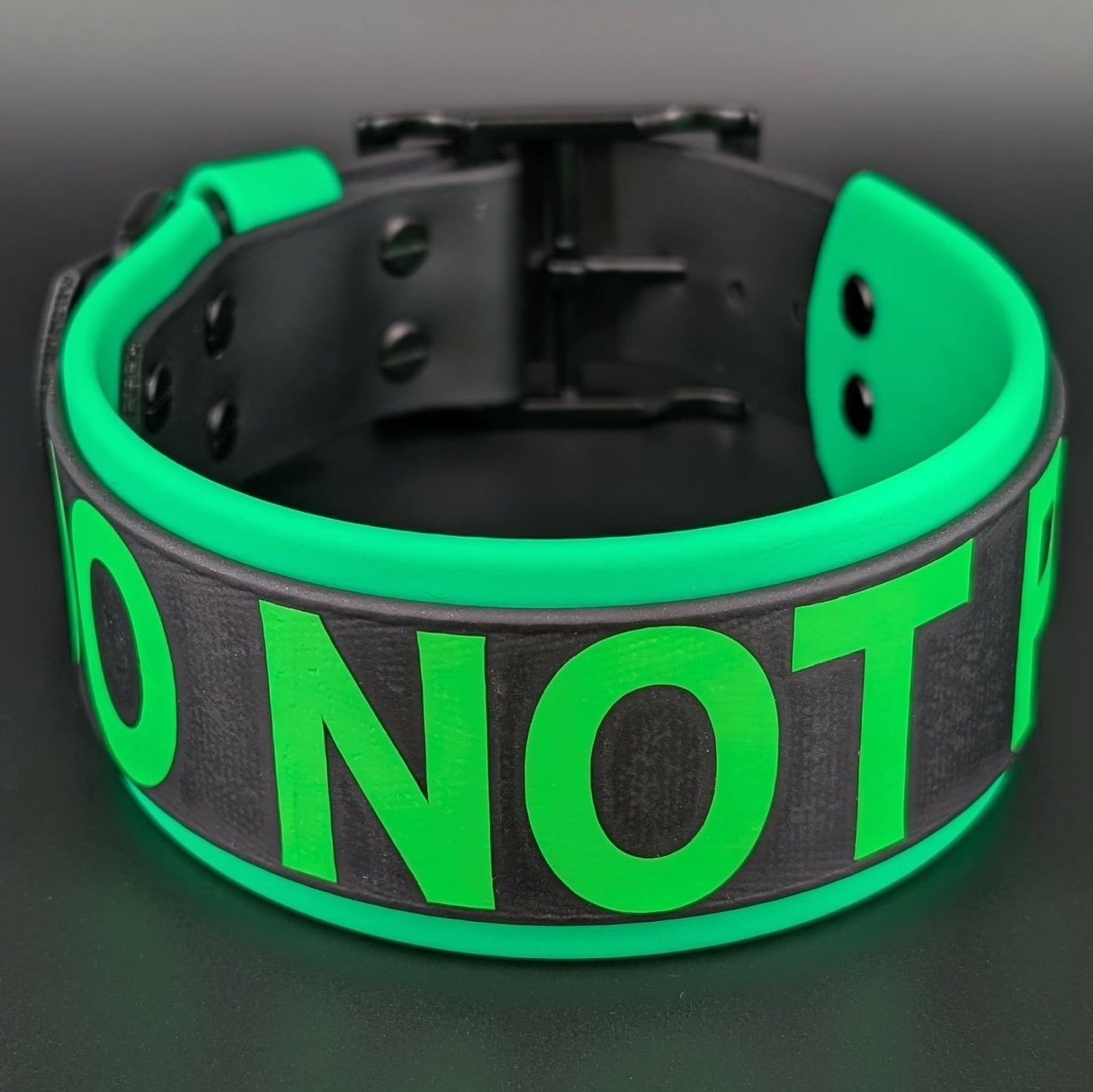 light green and black layered biothane dog collar with do not pet text