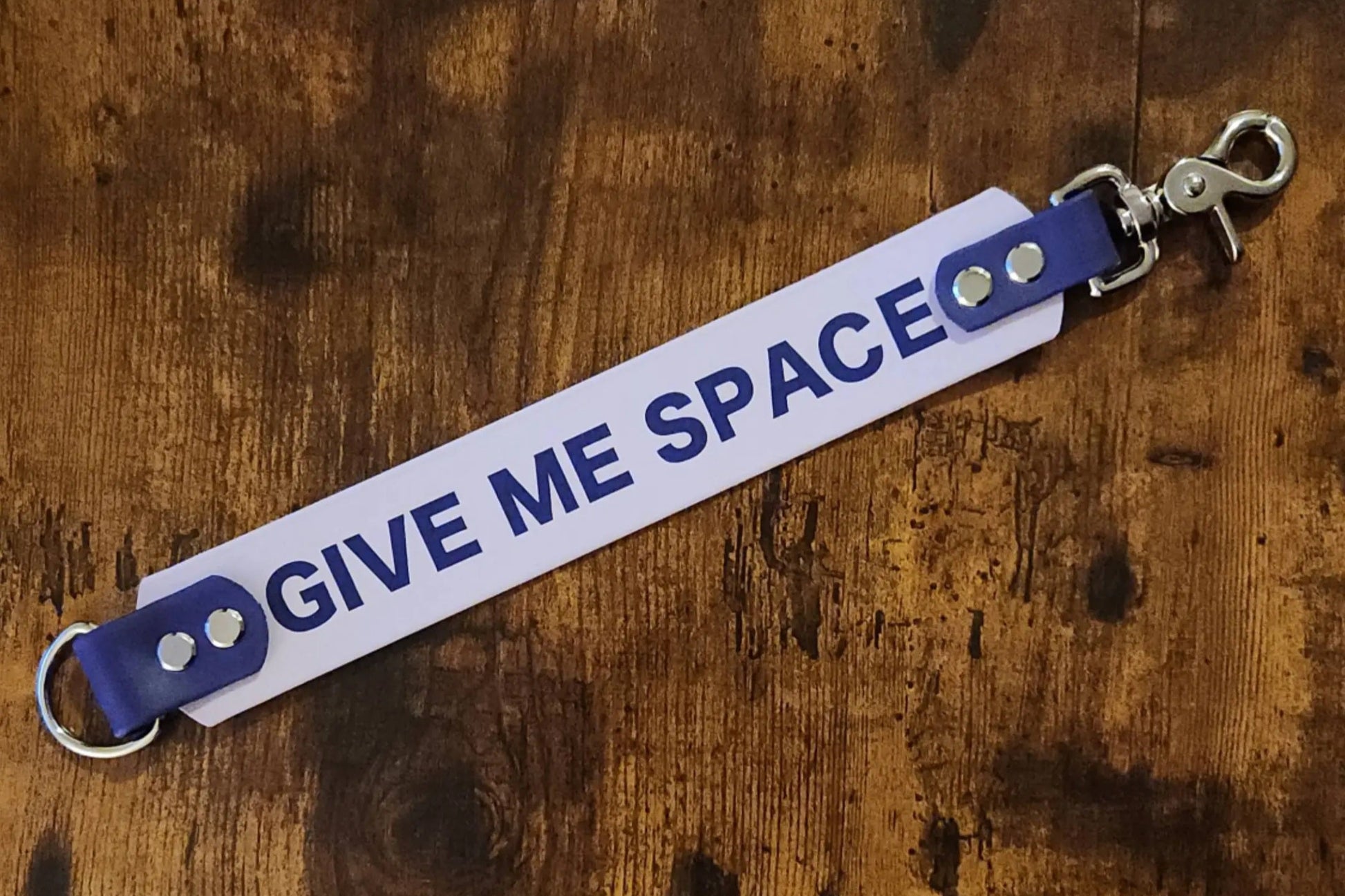 light purple and dark purple biothane leash wrap alternative with text reading "GIVE ME SPACE"