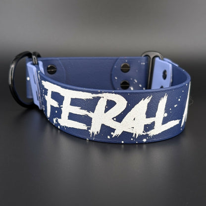 navy blue and periwinkle blue biothane limited slip collar with splatter paint and glitter feral af text