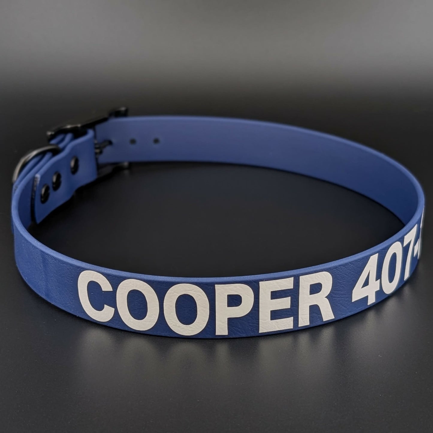 navy blue biothane dog collar with custom name and phone number