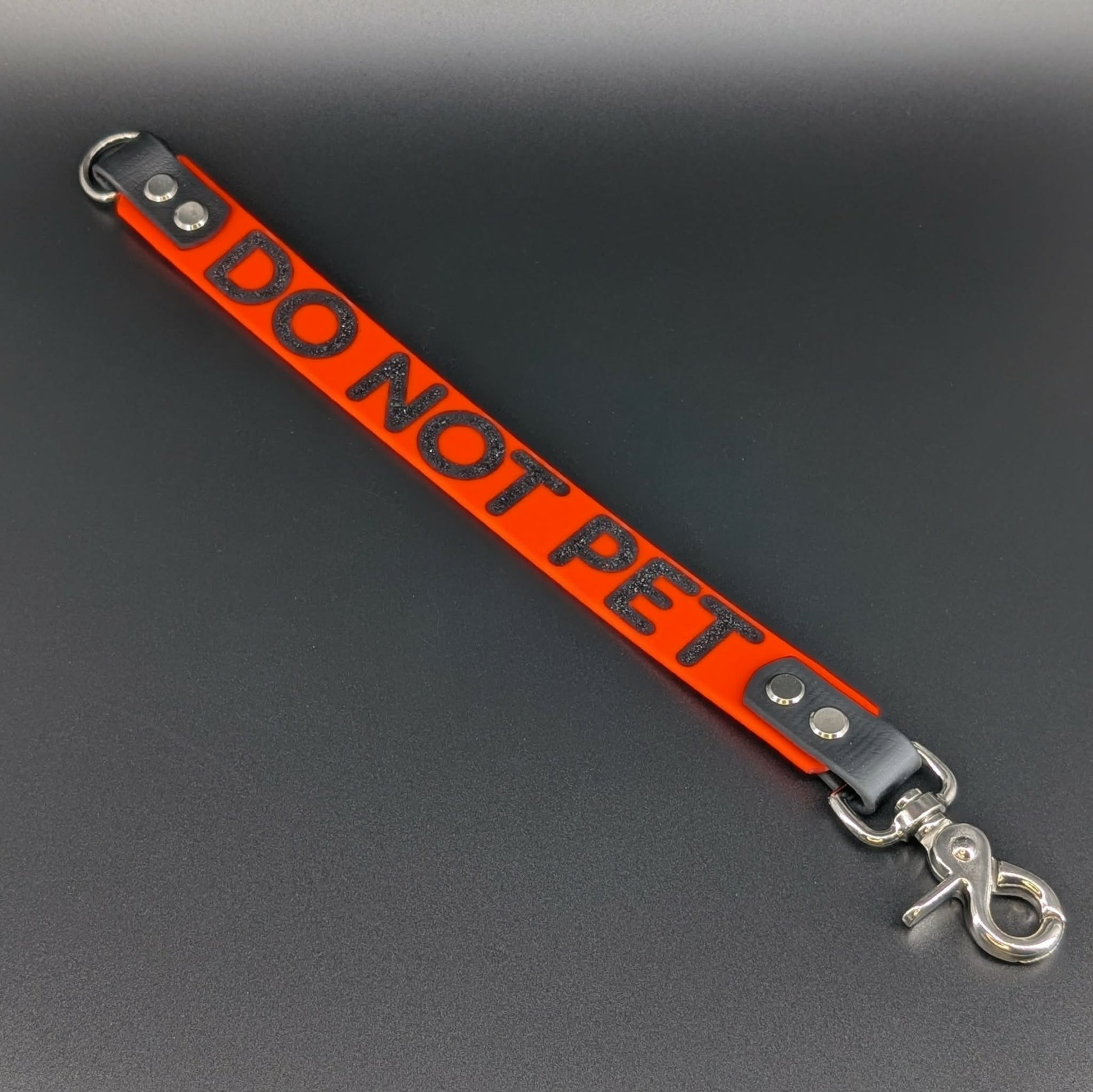 orange and black biothane do not pet leash warning