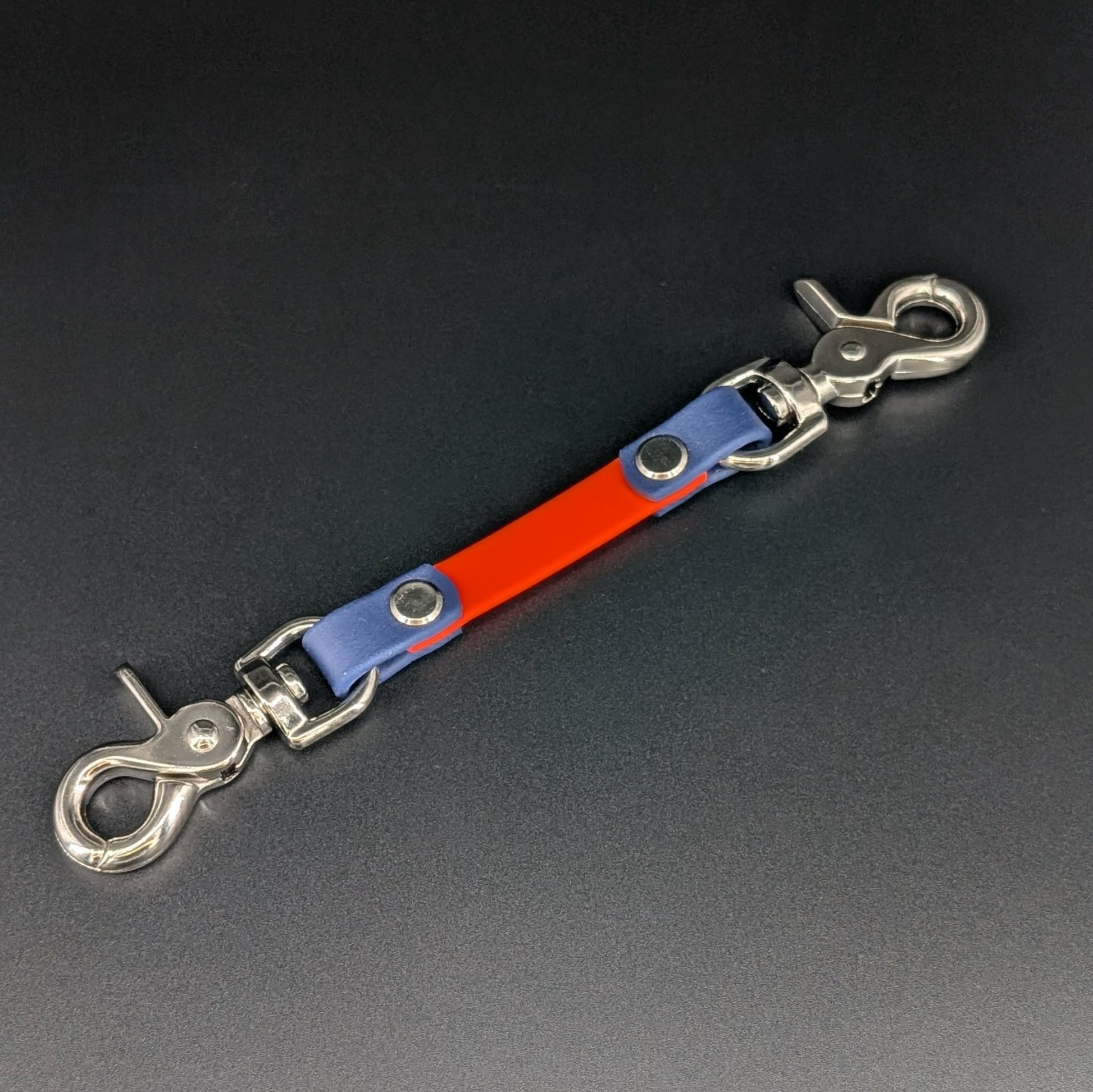 orange and navy blue biothane prong collar backup safety strap