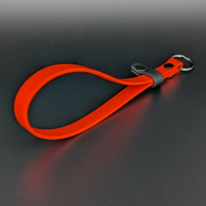 orange with black accent biothane wrist strap for e-collar remote