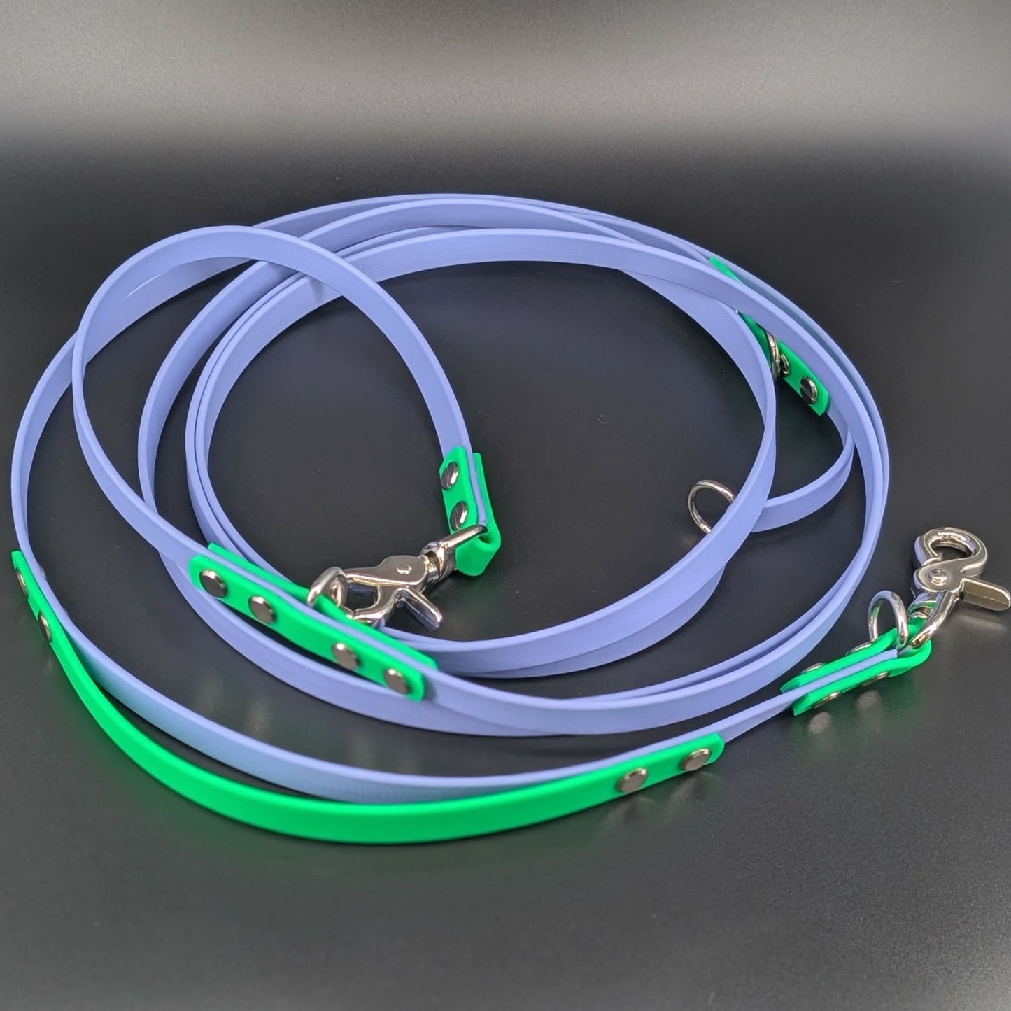 periwinkle blue and light green biothane hands free dog leash with built in traffic handle and adjustable waist attachment point
