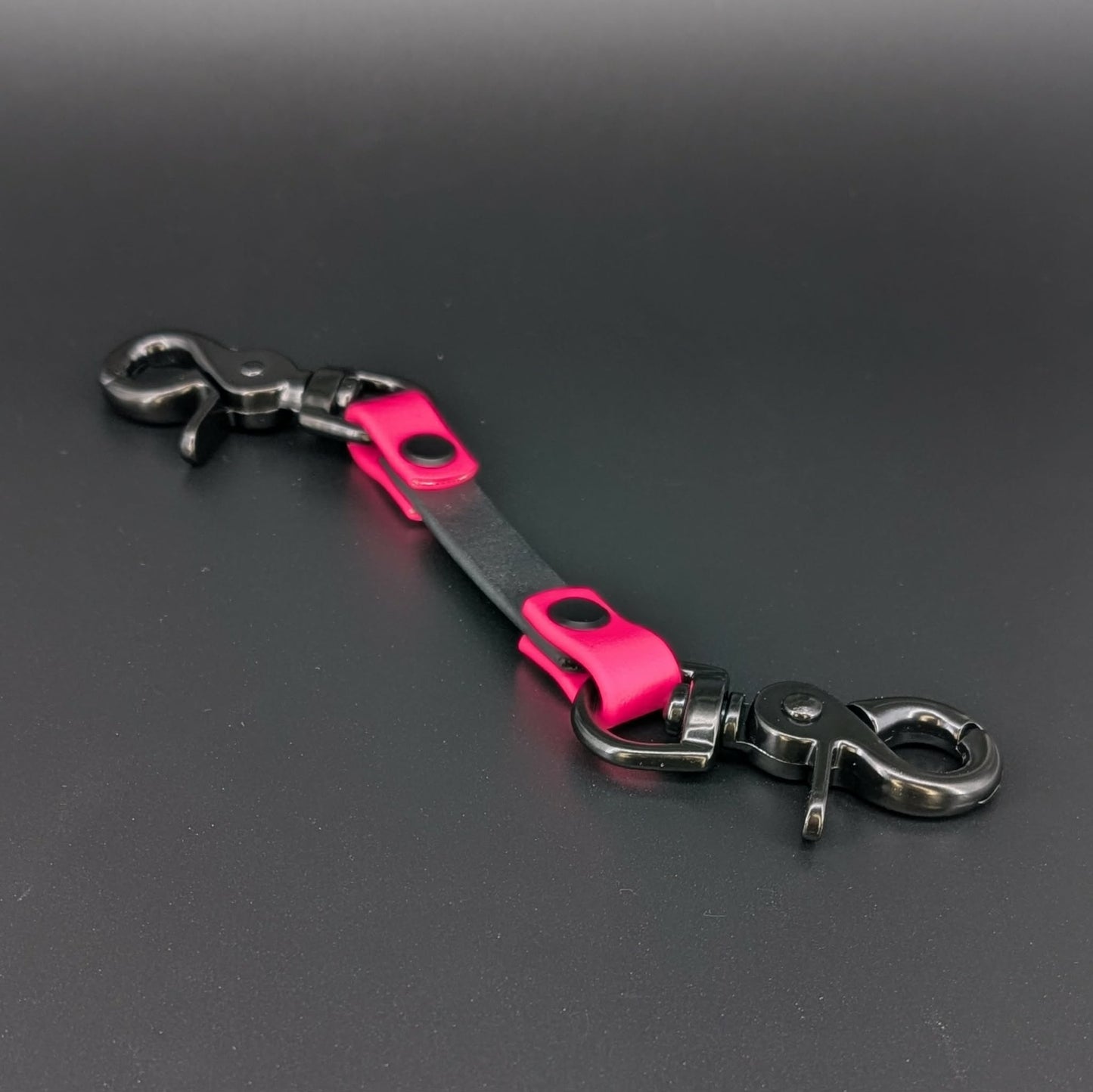 pink and black biothane prong collar safety backup clip