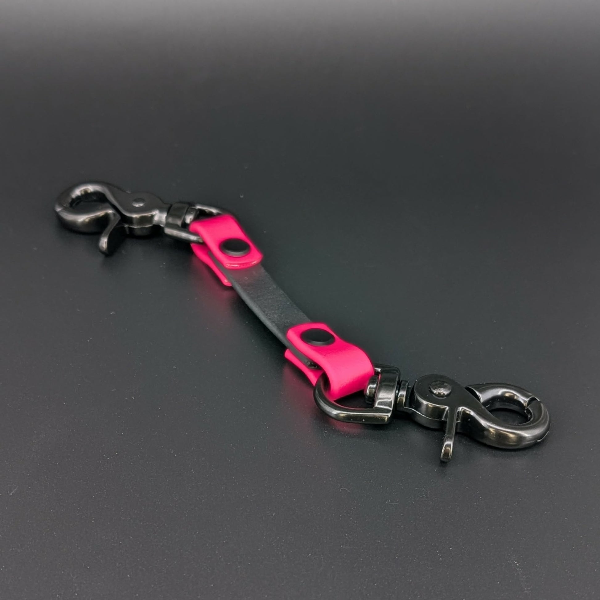 pink and black biothane prong collar safety backup clip