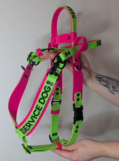 pink and green biothane y-front service dog harness with built-in counterbalance handle and detachable pull strap
