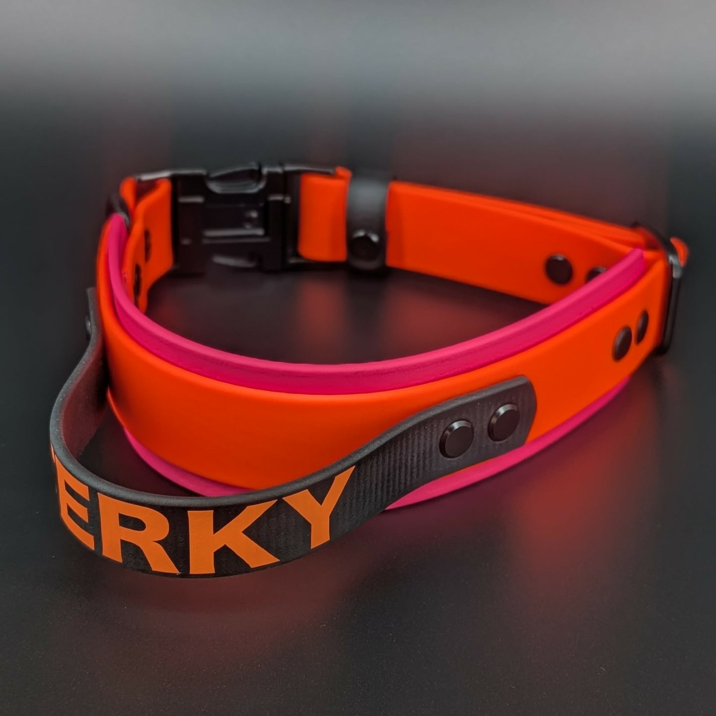 pink and orange layered biothane dog collar with tactical handle custom text and quick release buckle