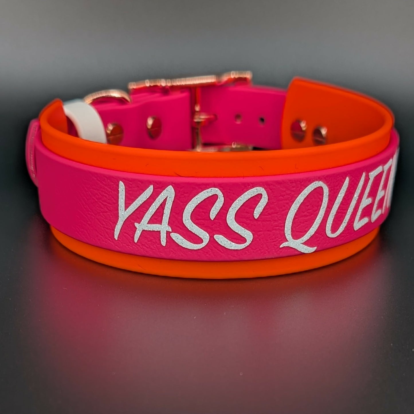 Pink and orange layered biothane dog collar with 'YASS QUEEN' text