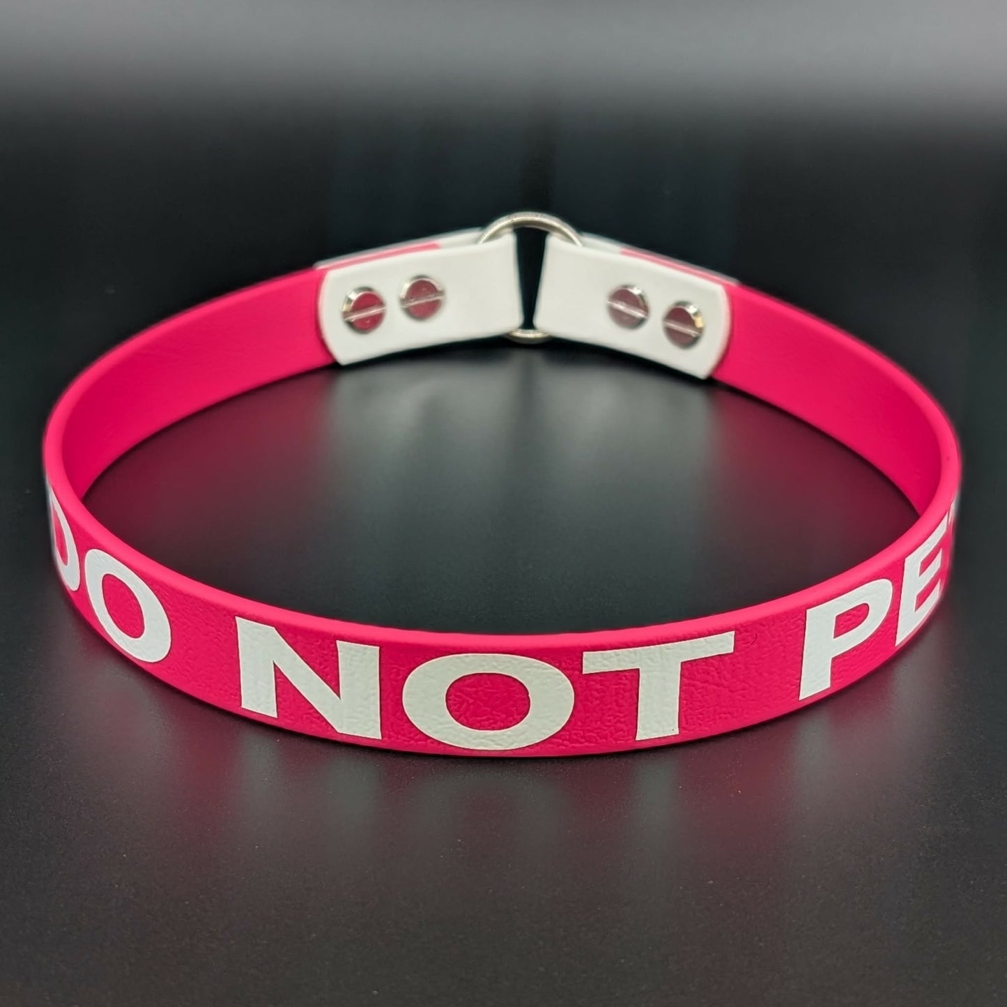 3/4 inch wide pink and white biothane tag collar with do not pet text