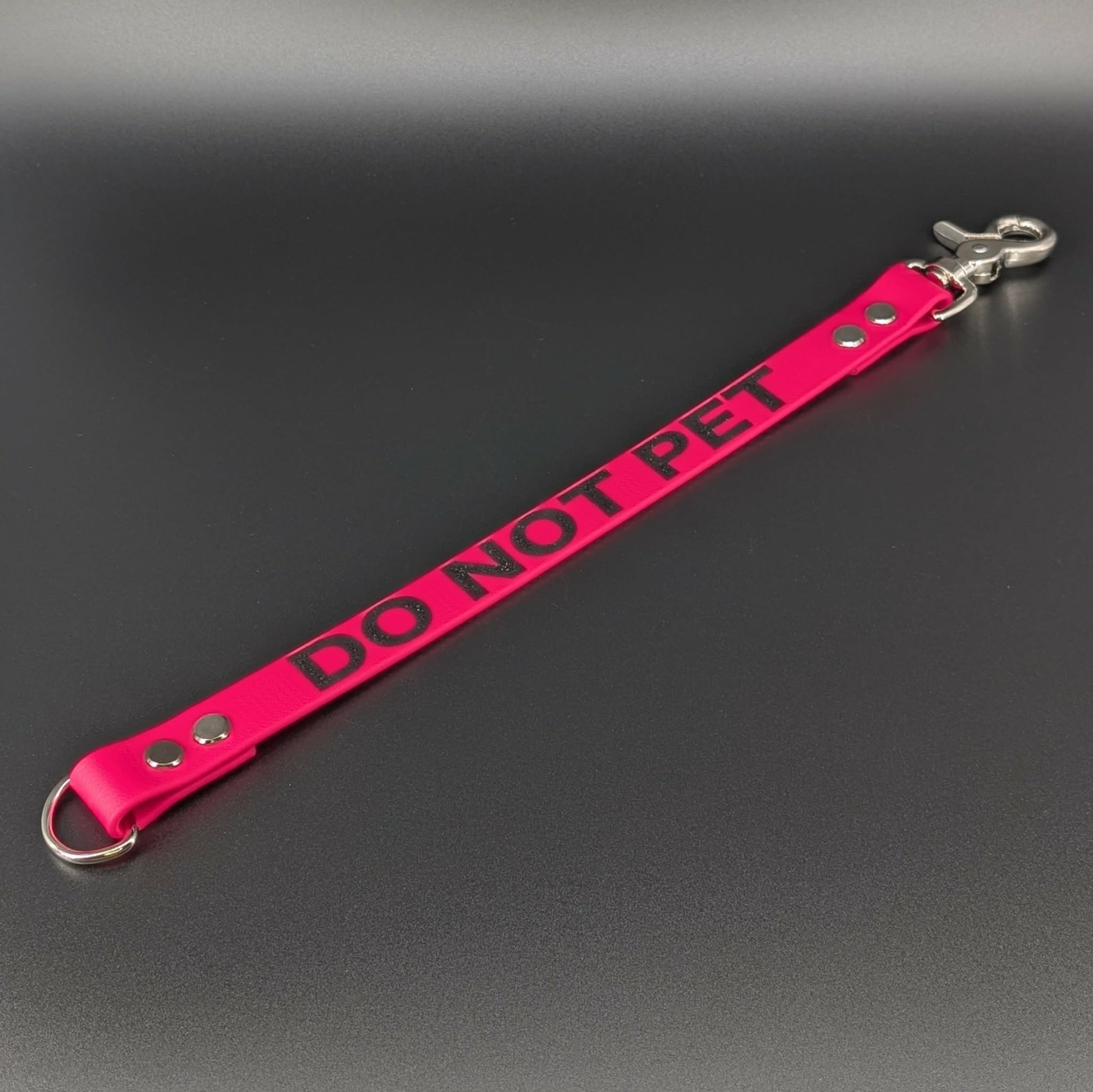 pink biothane leash extender with glitter do not pet text