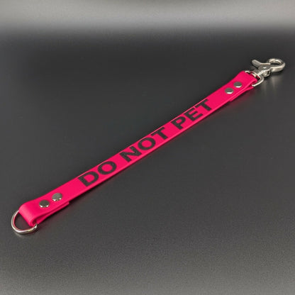 pink biothane leash extender with glitter do not pet text