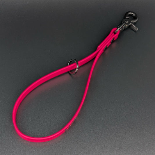 pink biothane traffic handle with floating o ring custom text and black hardware