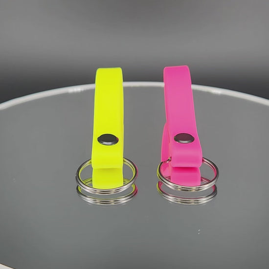 pink and yellow biothane key ring tabs