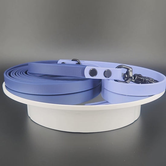 1/2 inch wide 10 feet long navy blue and periwinkle blue biothane dog leash with black trigger snap