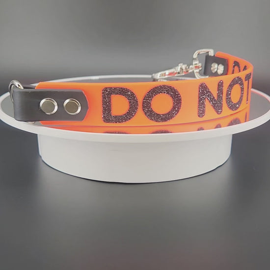 orange and black biothane do not pet leash warning
