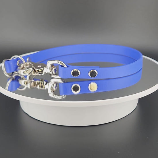 royal blue biothane slip collar with quick release clip also known as a dominant dog collar