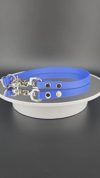 royal blue biothane slip collar with quick release clip also known as a dominant dog collar
