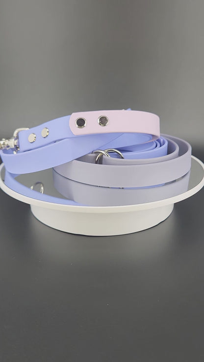 periwinkle blue, gray, and lavender biothane over the shoulder hands free dog leash with adjustable waist attachment point and built in traffic handle