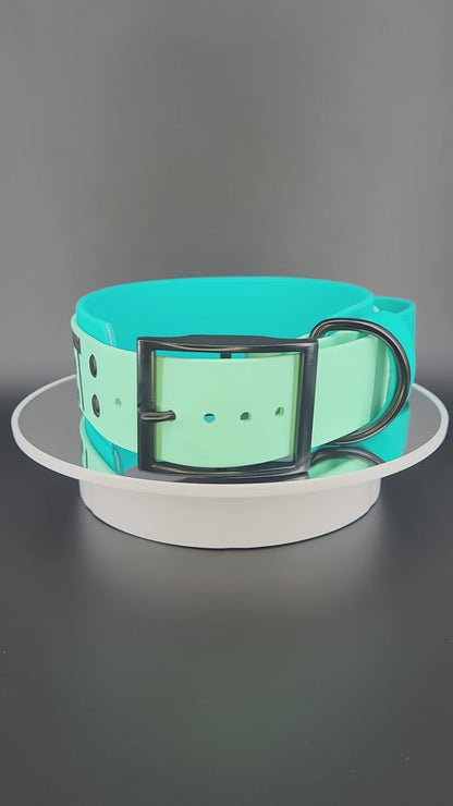 2 inch wide teal and mint green layered biothane dog collar with tactical handle and glitter do not pet text
