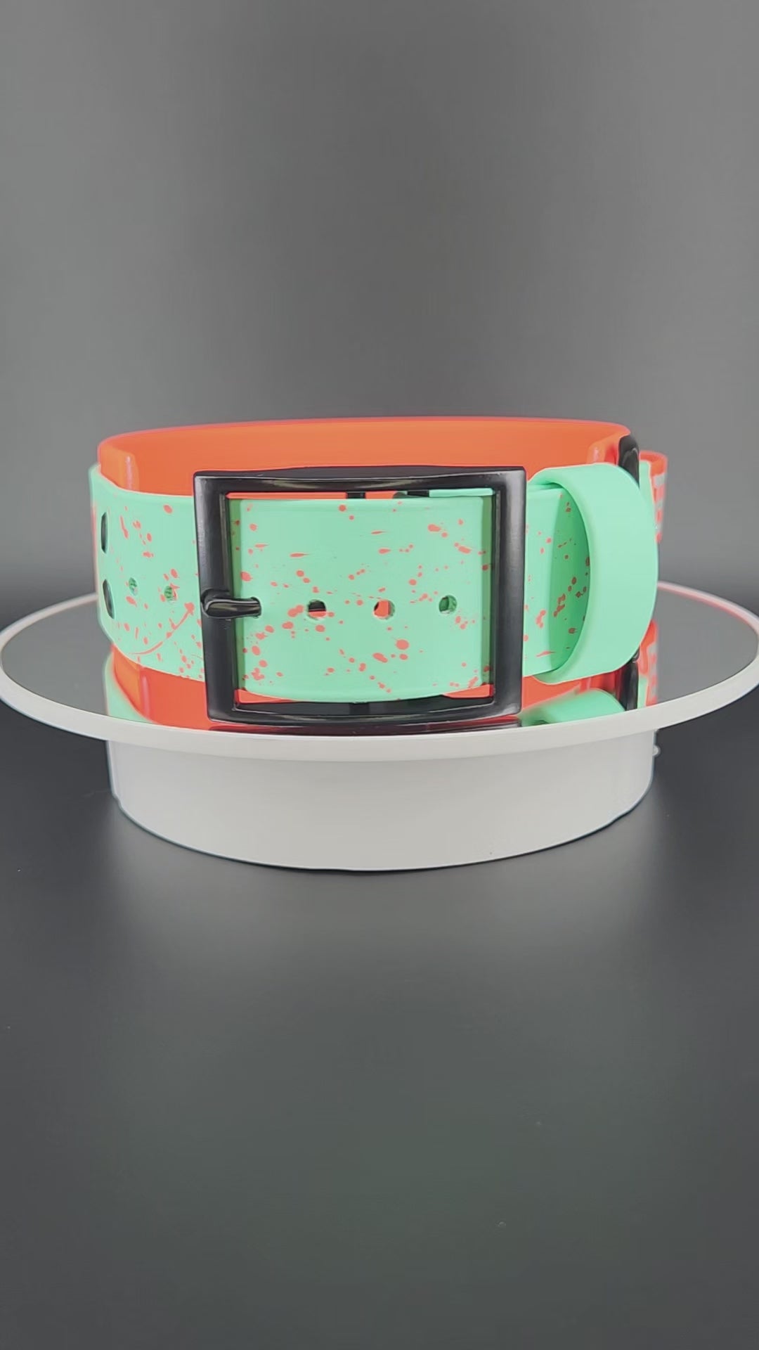 2 inch wide orange and sage green layered biothane dog collar with tactical handle, custom glitter text, and splatter paint